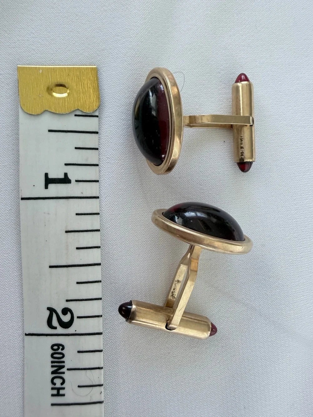 Classic Gold-Tone Cufflinks with Deep Red Cabochons
